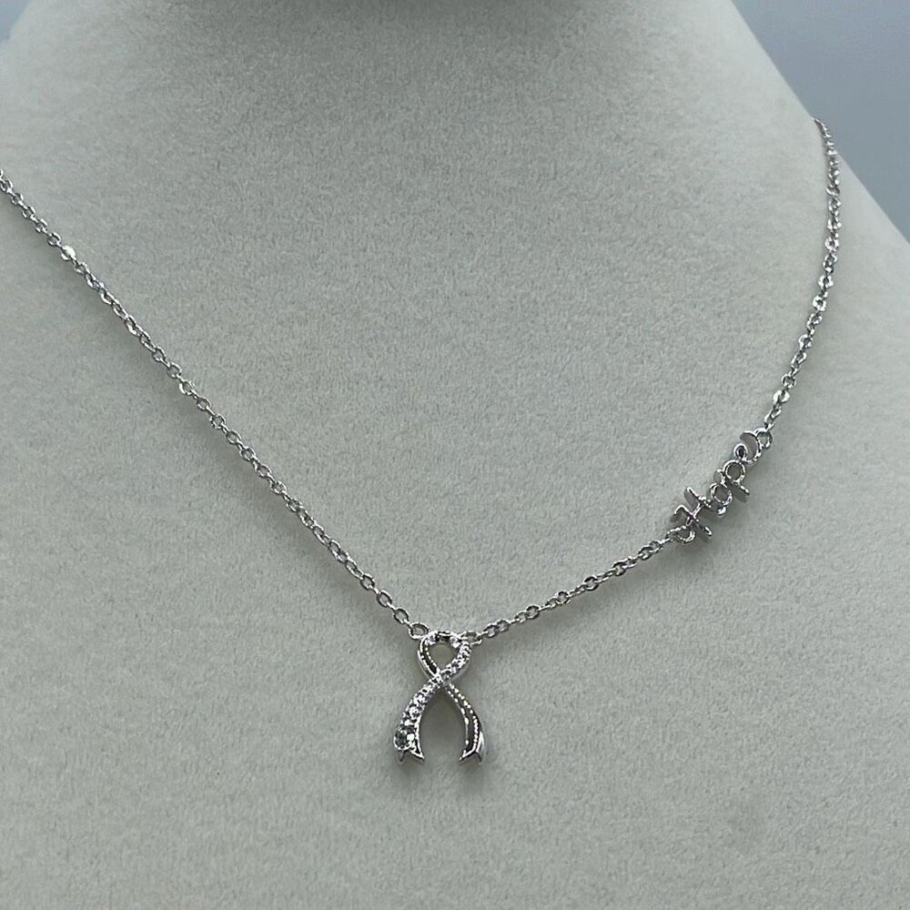 A.U. Ribbon and Hope Rhodium plated CZ necklace.